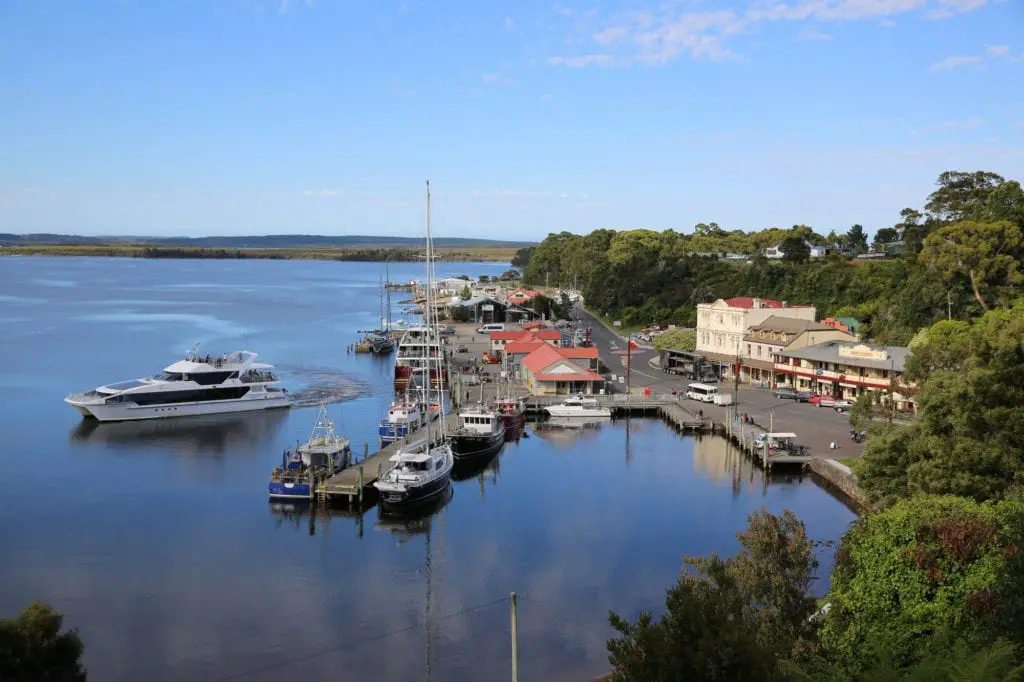 Tasmania itinerary - view overlooking the water to the town of Strahan