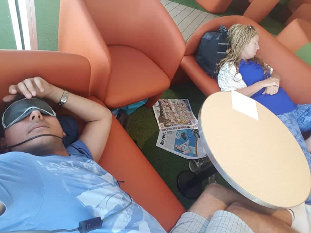 asleep on the couches on a boat. Tasmania itinerary