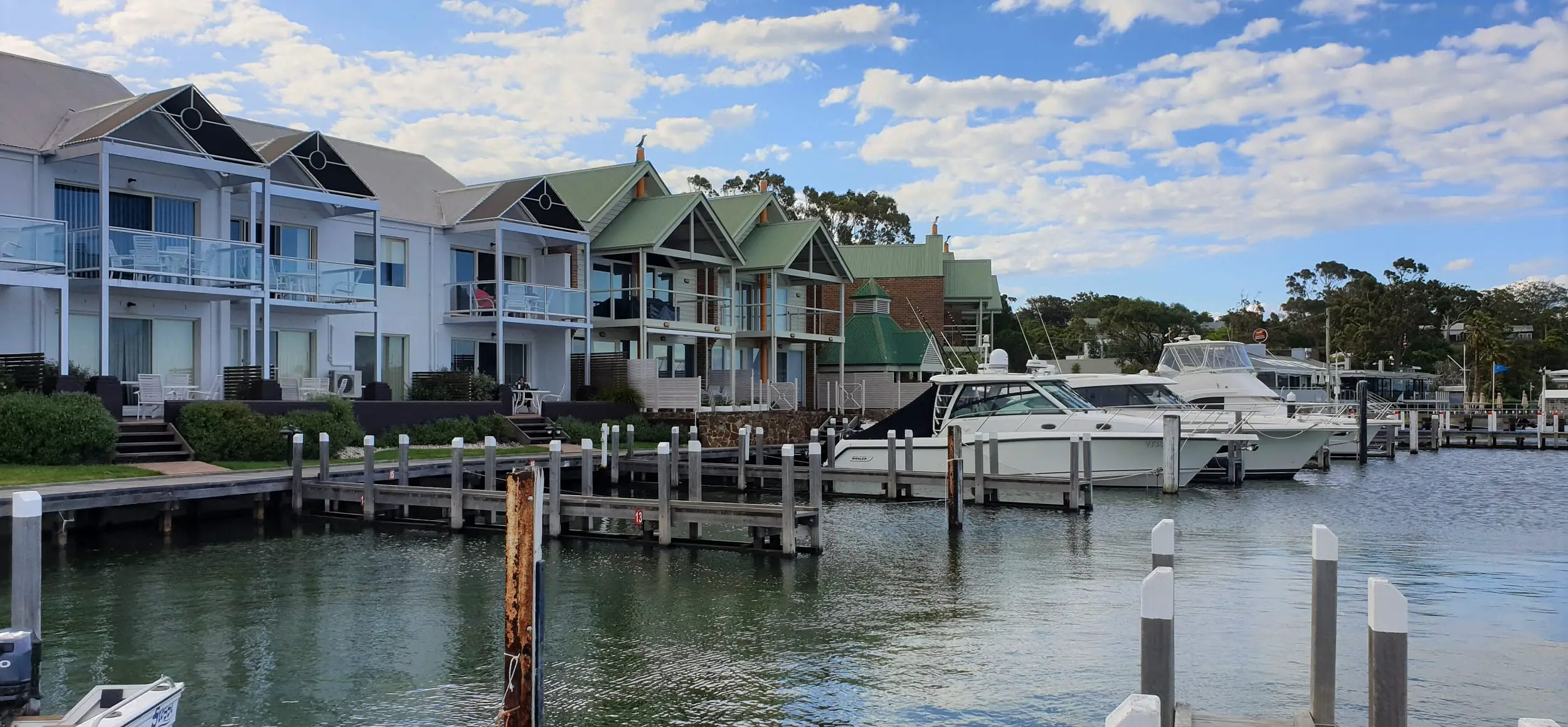 Moorings at Metung apartments with boats on the water out front Where to stay on the Gippsland Lakes. 